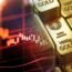 Gold Falls as Trade Tensions Ease, Dollar Gains