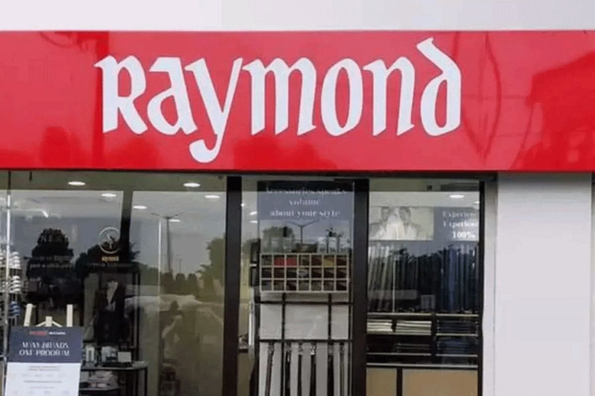 Raymond shares debut at 4% discount on NSE after demerger